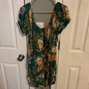 dark green floral romper.